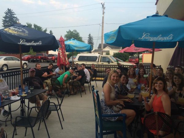 outdoor patio, full of people